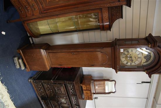 George Hewett of Marlborough. A George III oak eight day longcase clock, H.7ft 9in.